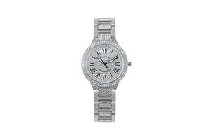 Macro shot of silver crystal-encrusted watch dial with Roman numerals and iced out bezel
