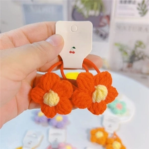 Paire d'élastiques à cheveux avec fleurs au crochet orange faites à la main pour filles