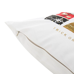 White Christmas pillow cover with golden Trick Or text and hidden zipper detail