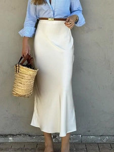 Elegant white satin midi skirt with brown leather belt and striped shirt outfit