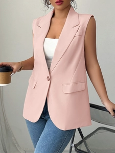Elegant sleeveless pink blazer vest for women featuring a single-button closure and pockets