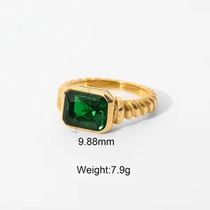 Vintage-Goldring mit smaragdgeschliffenem grünem Zirkon und gedrehtem Seil-Design