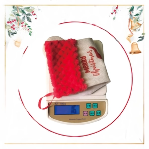 Close-up of lightweight 16g Christmas stocking with Merry Christmas embroidery