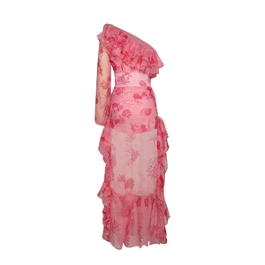 Detail of pink floral one-shoulder dress with layered ruffles and chiffon texture