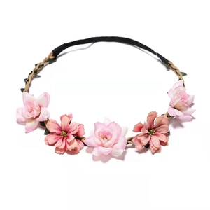 Bohemian floral headband with pink silk flowers and woven strap for bridal beach photos