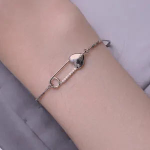 Elegant S925 sterling silver heart safety pin bracelet with cubic zirconia for women