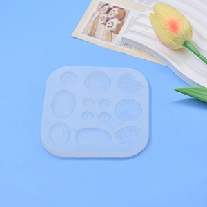 Blue silicone DIY mold for making miniature biscuits, candies and heart shapes