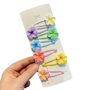 Set of 7 colorful cherry blossom hair clips in sweet pastel tones for girls and women