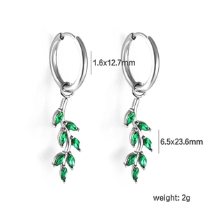 Macro view of silver leaf earrings with green marquise stones and detailed size markings