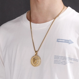 Close-up of hip hop gold lion head pendant with micro-pave crystals on man's neck