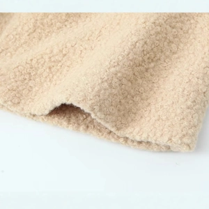 Women's long faux wool coat in warm beige featuring a premium fleece texture
