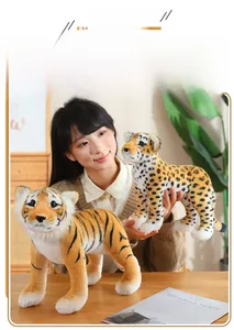 Detailed plush tiger and leopard stuffed animals in soft realistic faux fur texture