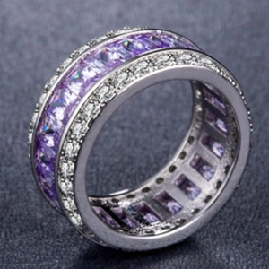 Elegant silver-tone ring featuring purple rectangular stones and sparkling white zircon pavé