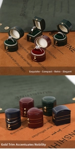 Detailed view of vintage jewelry boxes in various shapes with velvet lining and gold clasps