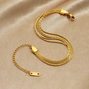 Chic multi-layer gold plated stainless steel woven chain bracelet on champagne silk