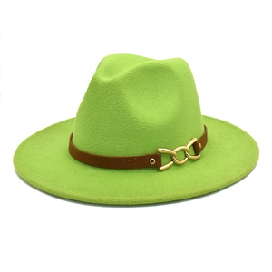 Detail of bright green wool fedora hat featuring brown faux leather band and gold metal chain