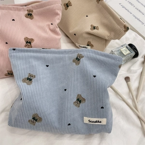 Three corduroy cosmetic bags with cute bear patterns and Sozakka label in pastel colors