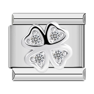 Macro detail of silver stainless steel modular link with crystal clover design
