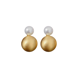 Minimalist double-ball stud earrings featuring white pearl and gold brushed metal finish