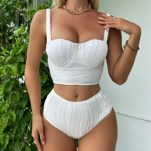 White ribbed high-waisted bikini set with textured fabric and structured cups