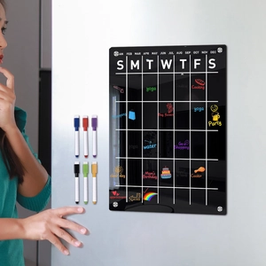 Magnetic black acrylic weekly calendar for fridge with colorful markers for planning