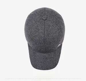 Top down view showing high quality dark gray wool fabric and stitching on baseball cap