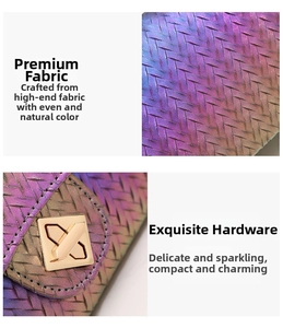 Detail of woven gradient purple texture and polished golden square metal twist lock