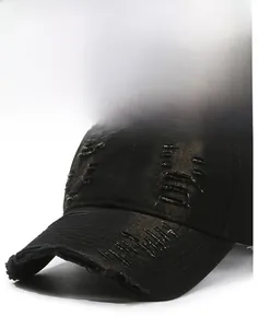 Detailed view of the distressed fabric and worn-out effects on the vintage baseball cap