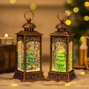 Vintage bronze Christmas lanterns with LED snow globe scene and swirling glitter effect