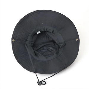 Detail of outdoor sun hat featuring breathable mesh lining and adjustable chin strap