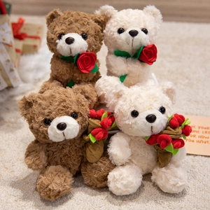 Cute teddy bear plush toy with red roses in brown and cream white for Valentine's gift
