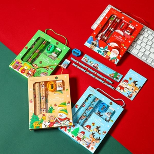 Christmas stationery gift set featuring festive pencils, rulers and notebooks in themed boxes