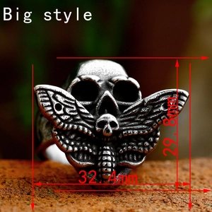Gothic moth skull ring in vintage stainless steel with detailed punk metal engraving