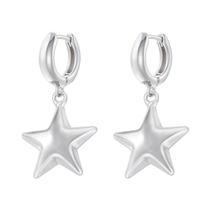 Macro shot of polished silver star earrings with a reflective metallic finish on a white background