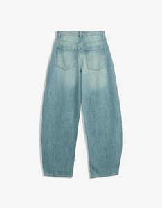 Detailed back view of light blue wide-leg jeans with classic pockets and denim texture