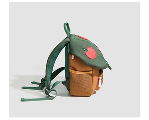 Detail view of the green kids backpack side profile featuring mesh pocket and strap