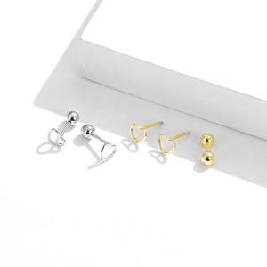 Minimalist S925 sterling silver hollow heart stud earrings in gold and silver finishes