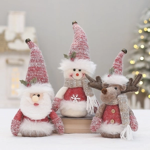 Pink Christmas plush doll collection with Santa, Snowman and Reindeer figurines