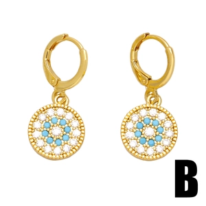 Fashionable vintage evil eye hoop earrings with blue and white zircons in gold frames