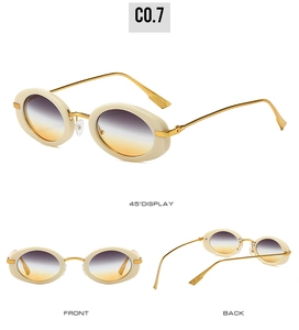 Detail of retro oval sunglasses with cream frame, gold temples, and gradient lenses