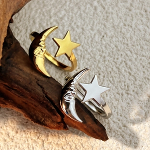 Minimalist celestial open rings with moon and star relief in gold and silver finishes