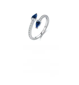 Macro shot of S925 sterling silver ring showing the inner S925 stamp and royal blue stones