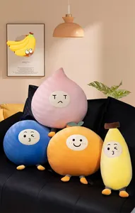 Detail view of colorful fruit plush pillows with cute expressions on a black sofa