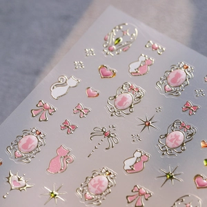 Stickers ongles chat rose avec nœuds dorés 3D et motifs de gemmes pour manucure douce