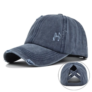 Vintage washed denim baseball cap with ponytail hole and embroidered H logo