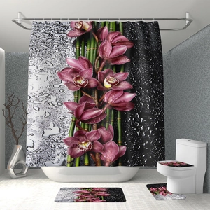 Detail view of 4-piece bathroom set with zen purple orchid and green bamboo prints