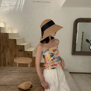 Women's wide brim camel straw sun hat with black ribbon and floral tube top