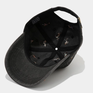 Detailed internal view of grey washed cotton baseball cap with puppy embroidery