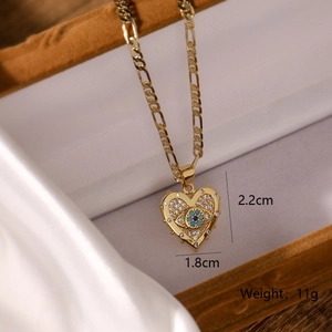 Gold plated heart evil eye pendant necklace with blue cubic zirconia on silk lining