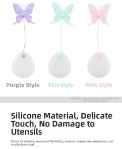 Three colorful butterfly silicone tea strainers in purple blue and pink on white background